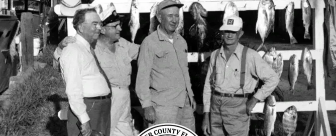 Fishermen at the Rod & Gun Club Centennial Banner Sponsored by Barbara and Richard Kearney